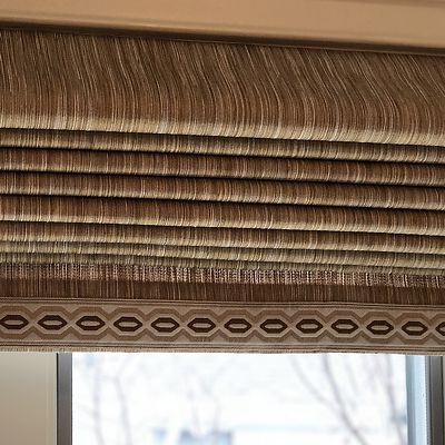 Details on the window treatments add interest and dimension.