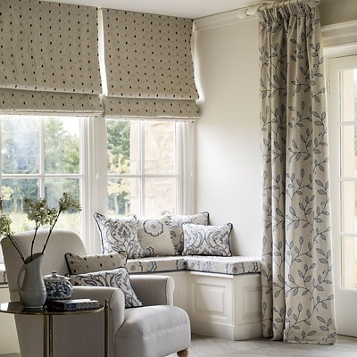 Duralee roman shades with upholstered furnture and accent pillows